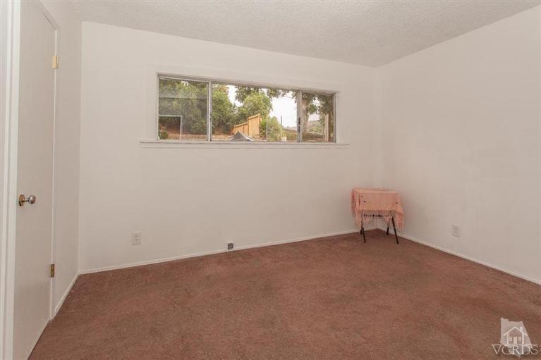 445 Charles Street Moorpark, CA 93021 - Photo 6 of 24 an empty room with a window