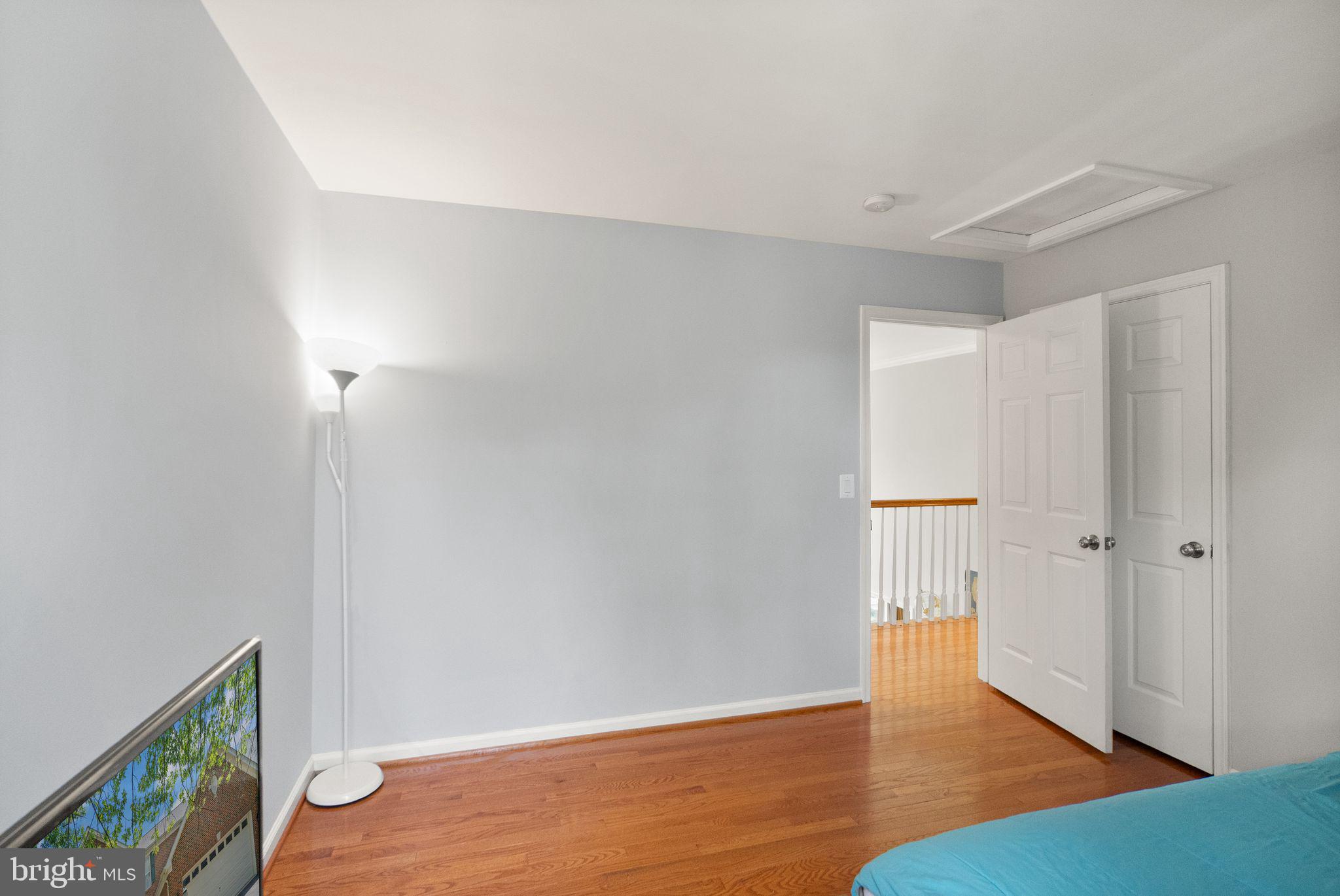 6901 Bitterroot Court Gainesville, VA 20155 - Photo 47 of 98 a view of an empty room with wooden floor