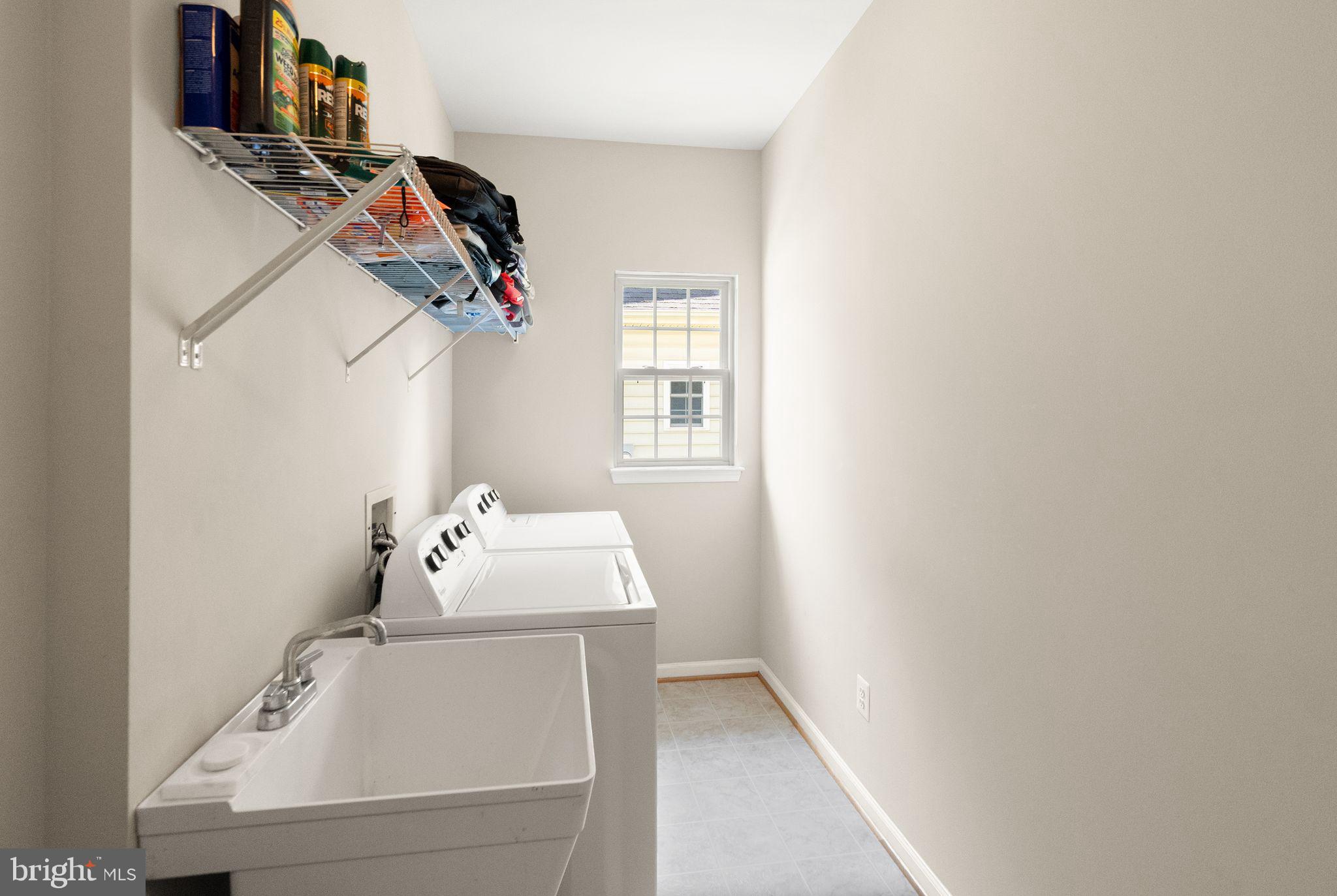 6901 Bitterroot Court Gainesville, VA 20155 - Photo 50 of 98 a utility room with dryer and washer
