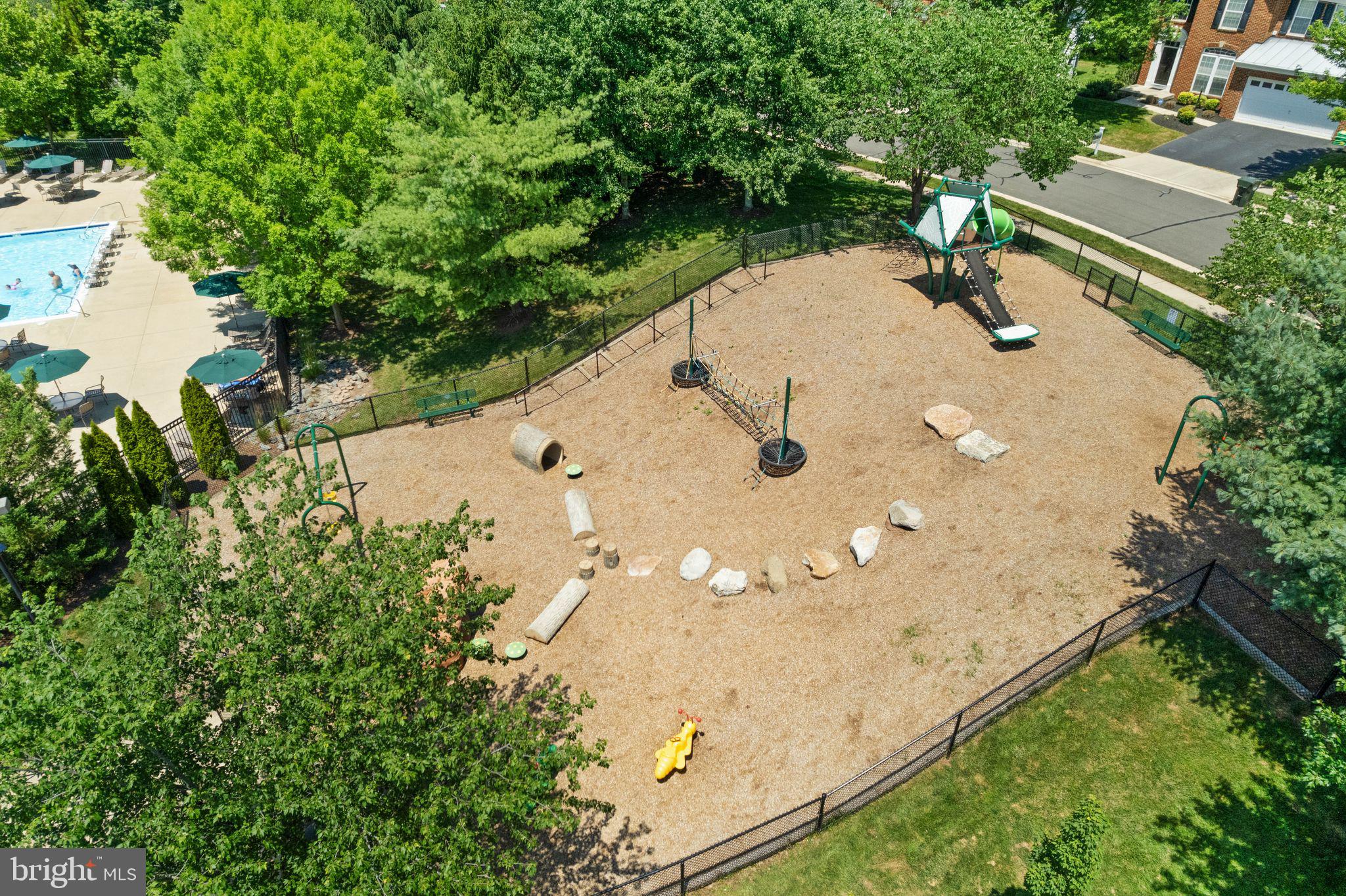 6901 Bitterroot Court Gainesville, VA 20155 - Photo 81 of 98 an aerial view of a house with a yard and lake view