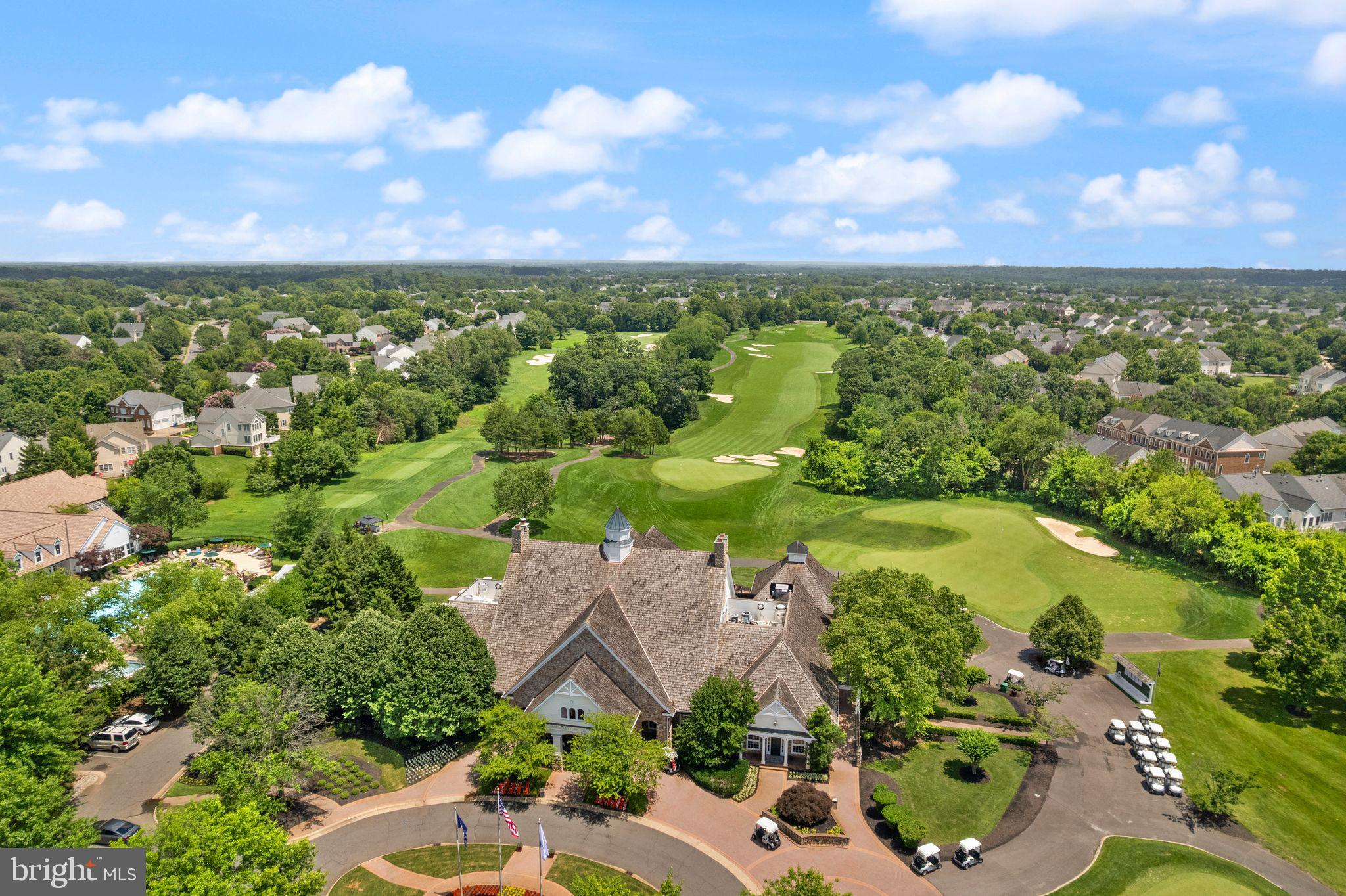 6901 Bitterroot Court Gainesville, VA 20155 - Photo 90 of 98 an aerial view of residential houses with outdoor space and lake view