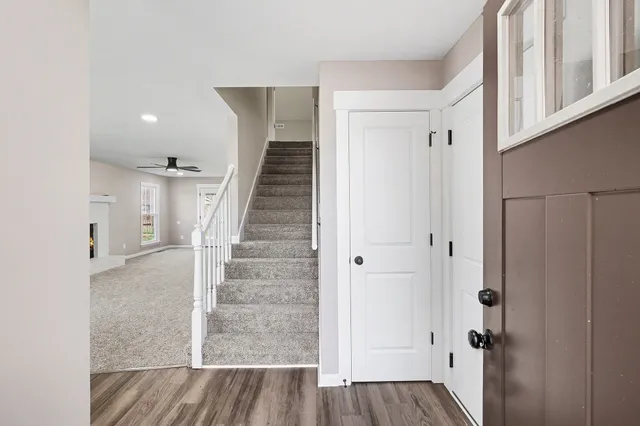 a view of entryway with wooden floor