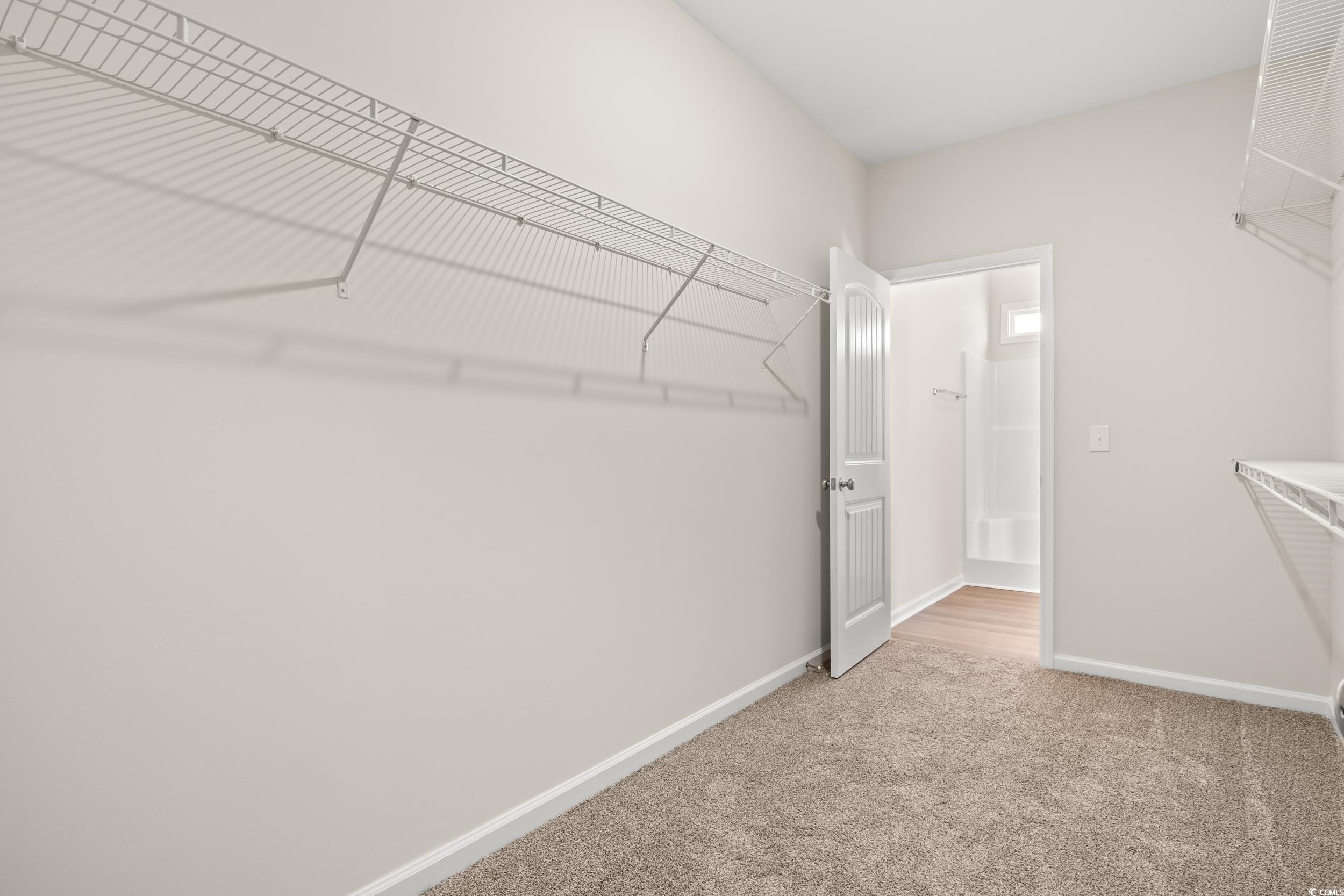 609 Bay Street Aynor, SC 29544 - Photo 14 of 17 Spacious closet featuring light carpet