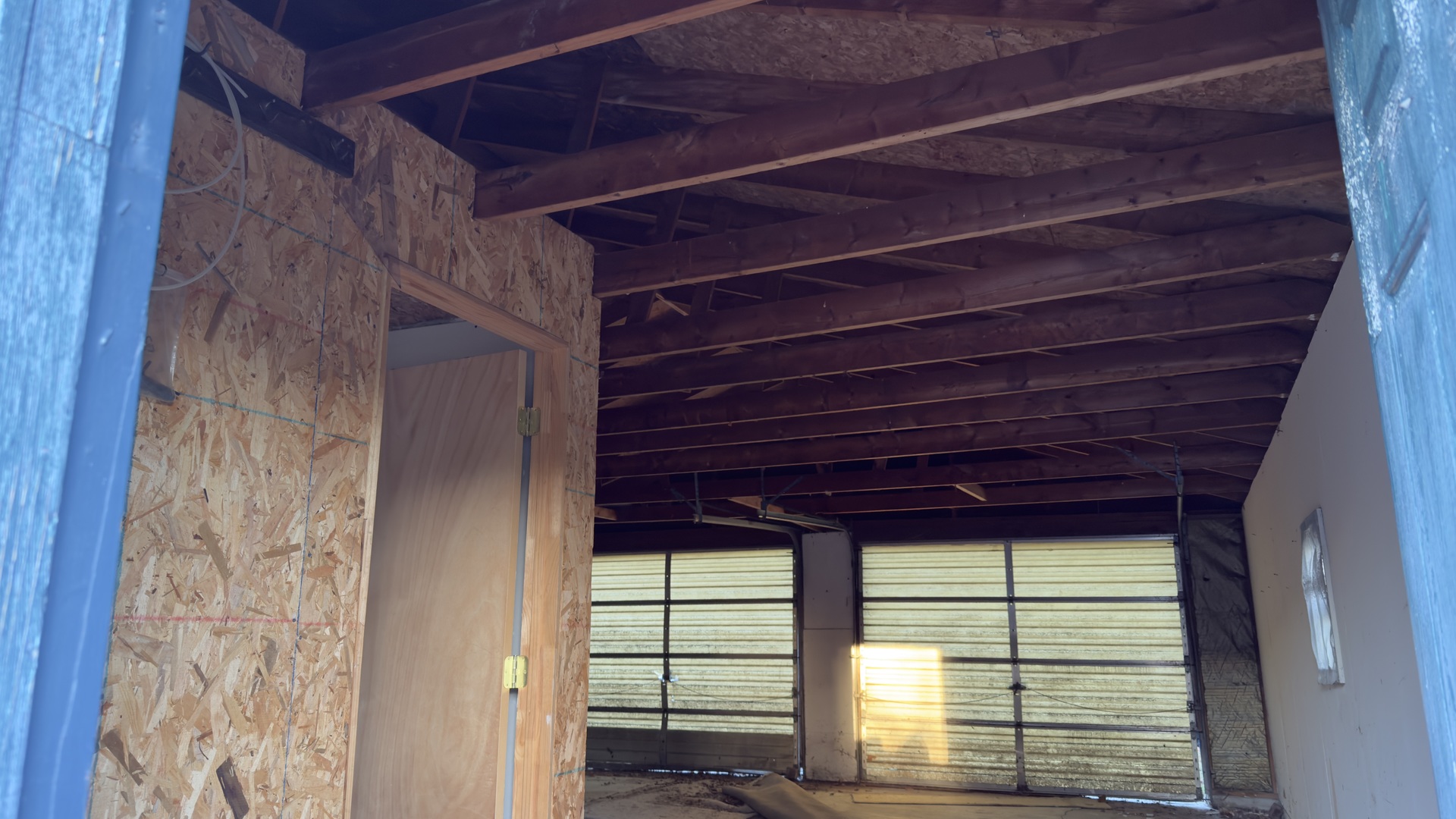 320 South Main Street Atwood, IL 61913 - Photo 2 of 4 a view of a room that has a large window and wooden floor