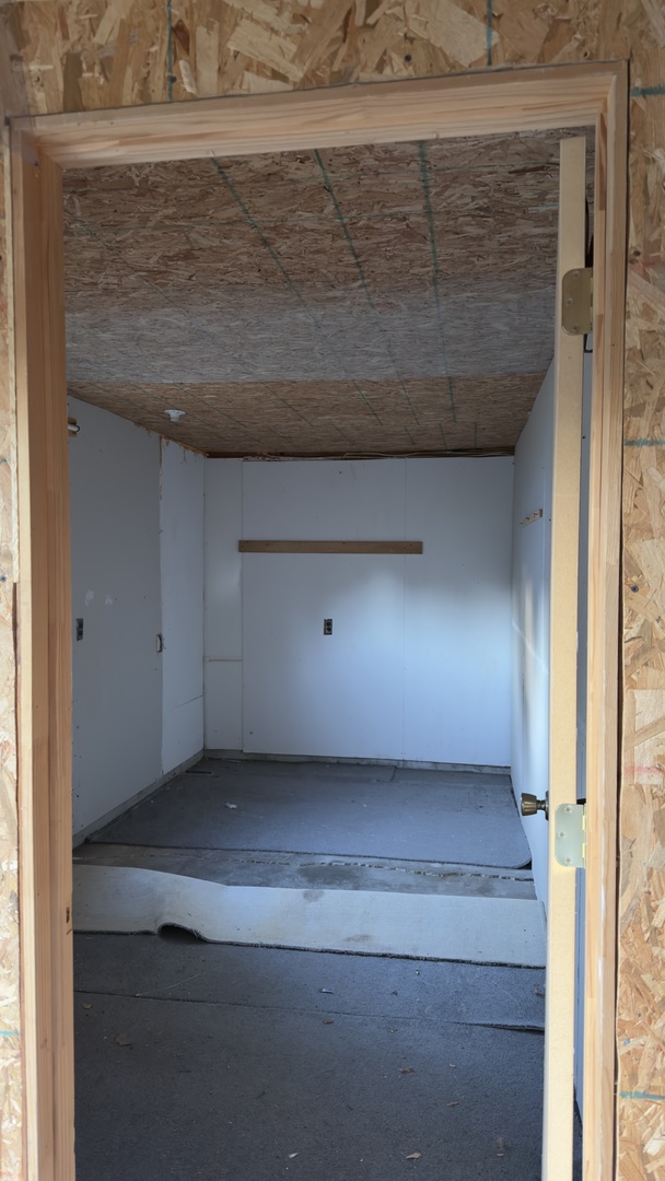 320 South Main Street Atwood, IL 61913 - Photo 3 of 4 a view of a livingroom with an empty space and a window