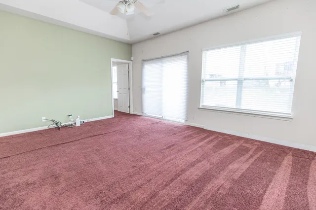 a view of kitchen with wooden floor and window