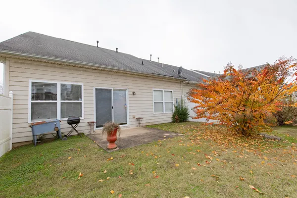 a view of a lake with a building in the background