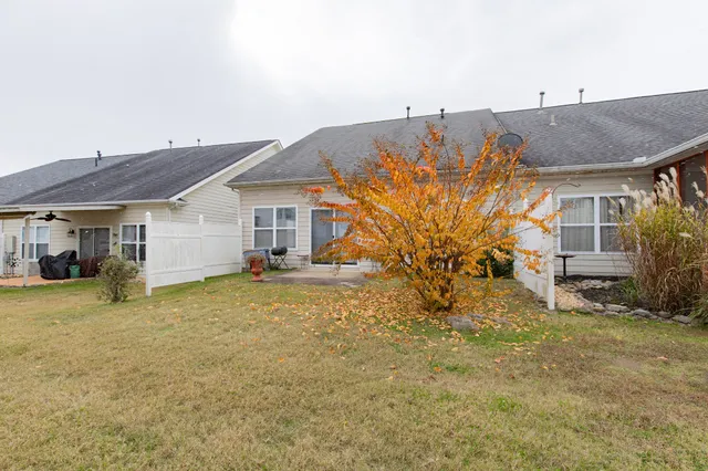 a view of a wrought iron fences in front of house