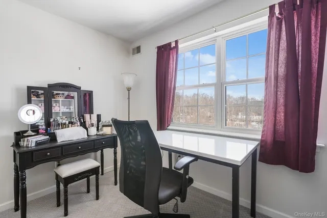 a bed room with a bed and a couch