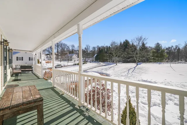 a view of entryway and hall with dining room