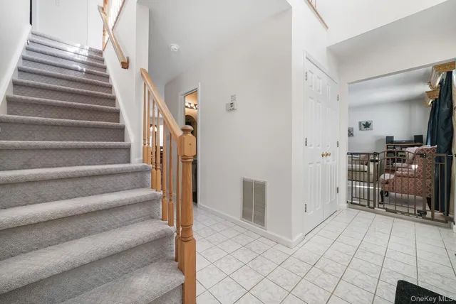 a view of an entryway with staircase