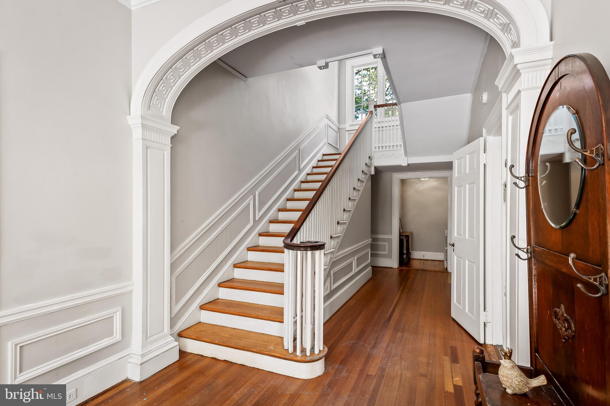 14 Midvale Road Baltimore, MD 21210 - Photo 13 of 91 a view of a hallway with wooden floor and staircase