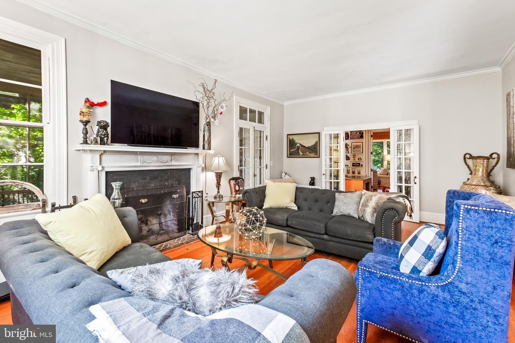14 Midvale Road Baltimore, MD 21210 - Photo 16 of 91 a living room with furniture a flat screen tv and a fireplace