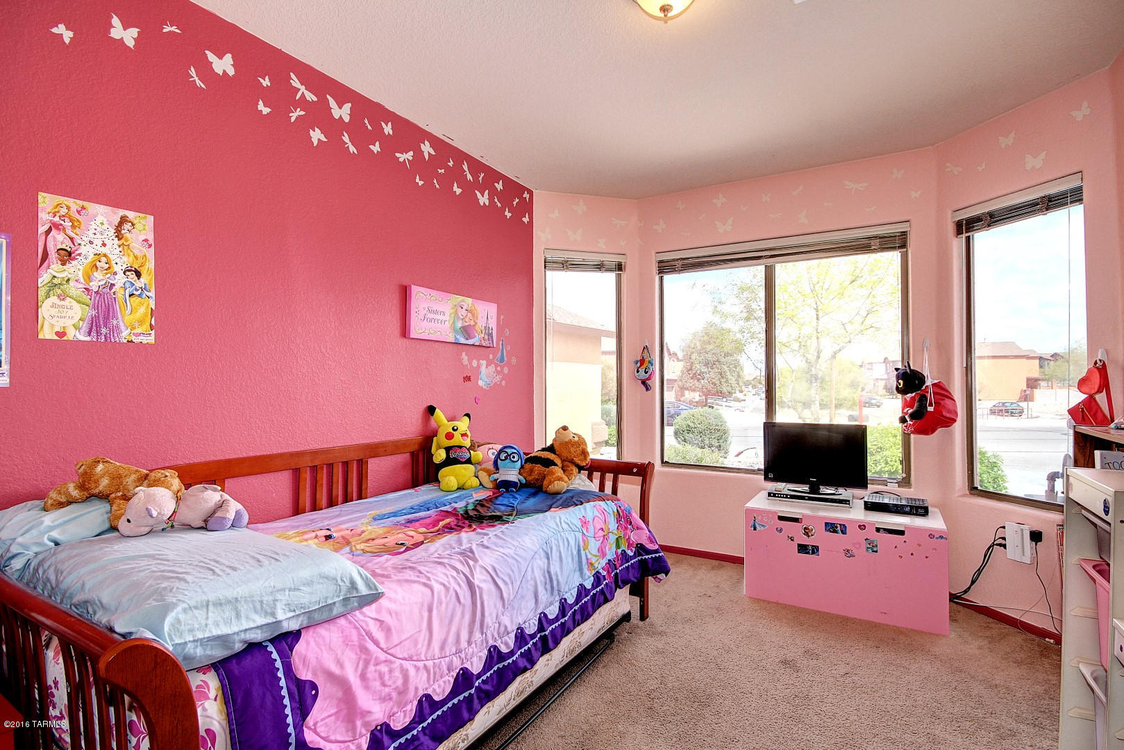 6016 South Avenida Ribero Tucson, AZ 85706 - Photo 11 of 15 a bedroom with a bed and large windows