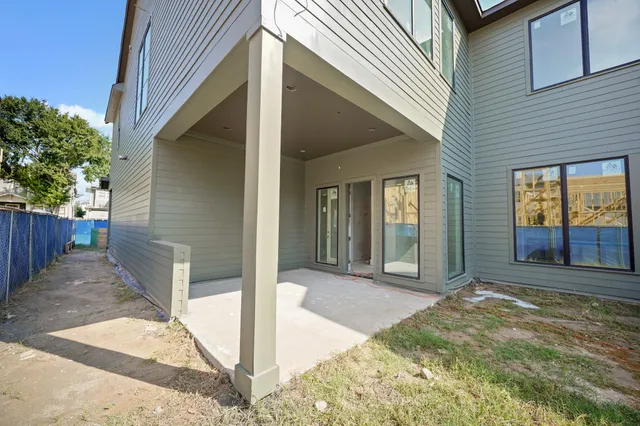 a view of a front door and porch with seating space