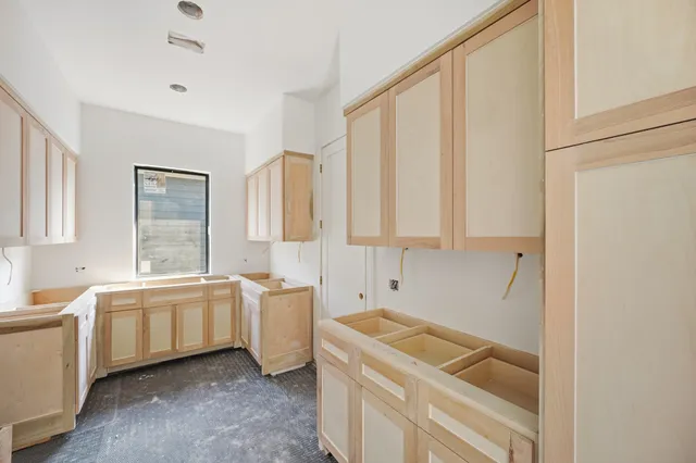 a room with a sink and a window