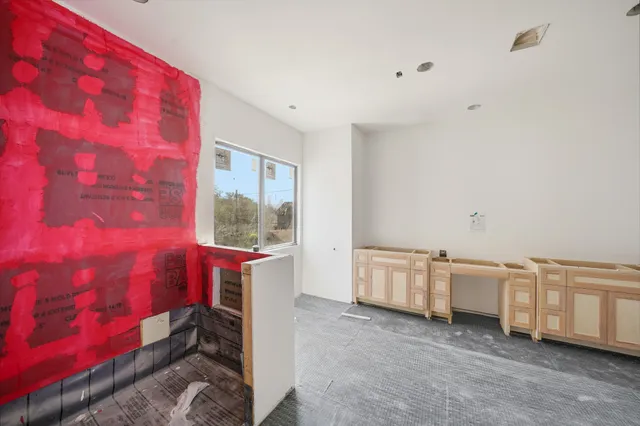 a room with furniture and a window