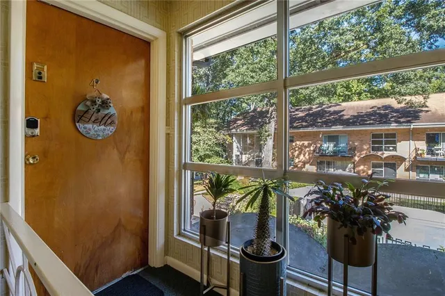 a view of a entryway with wooden floor