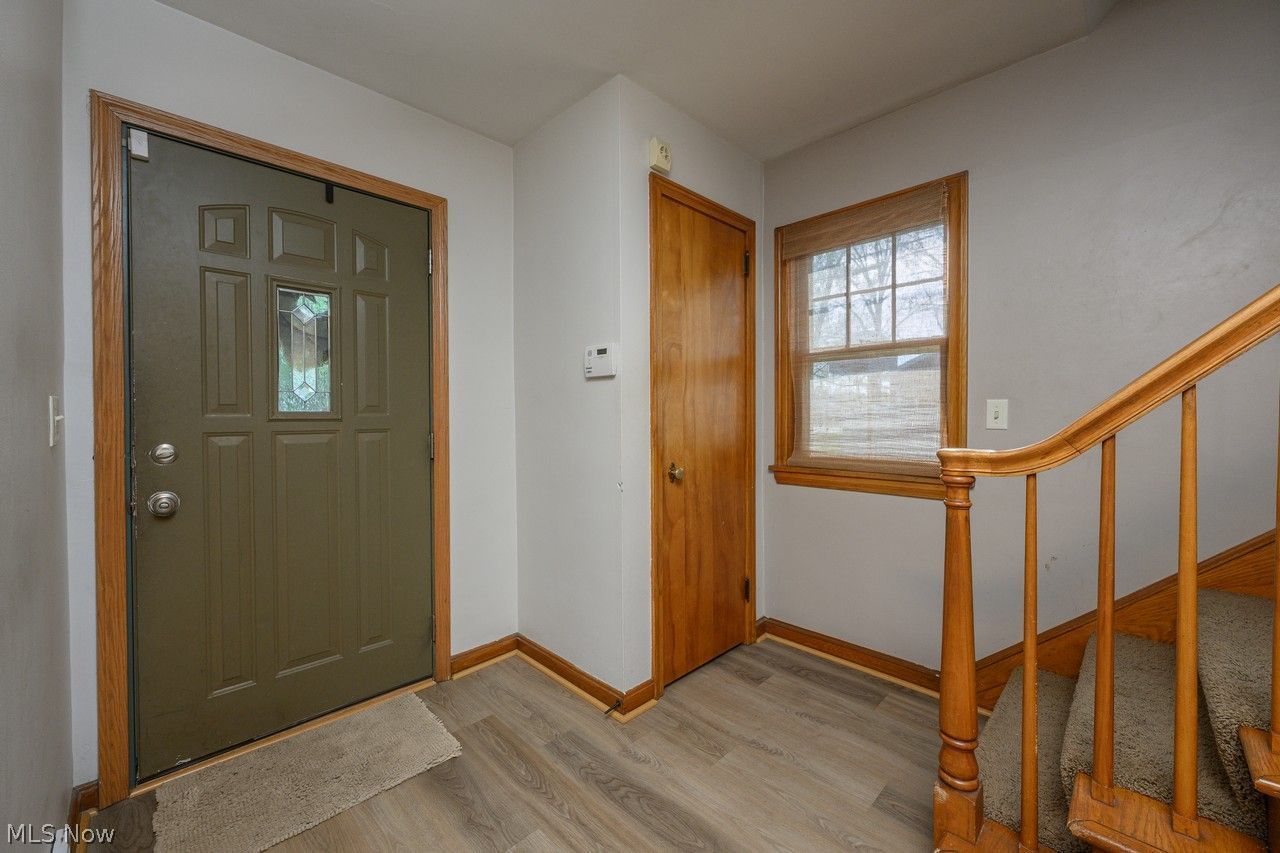 4361 22nd Street Northwest Canton, OH 44708 - Photo 4 of 31 Entrance foyer with coat closet and LVT flooring