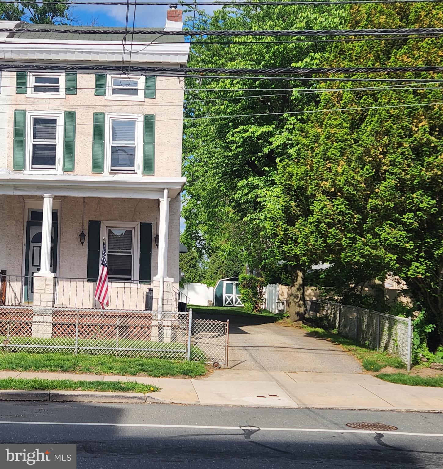 6783 Ridge Avenue Philadelphia, PA 19128 - Photo 1 of 26 a view of a house with a yard