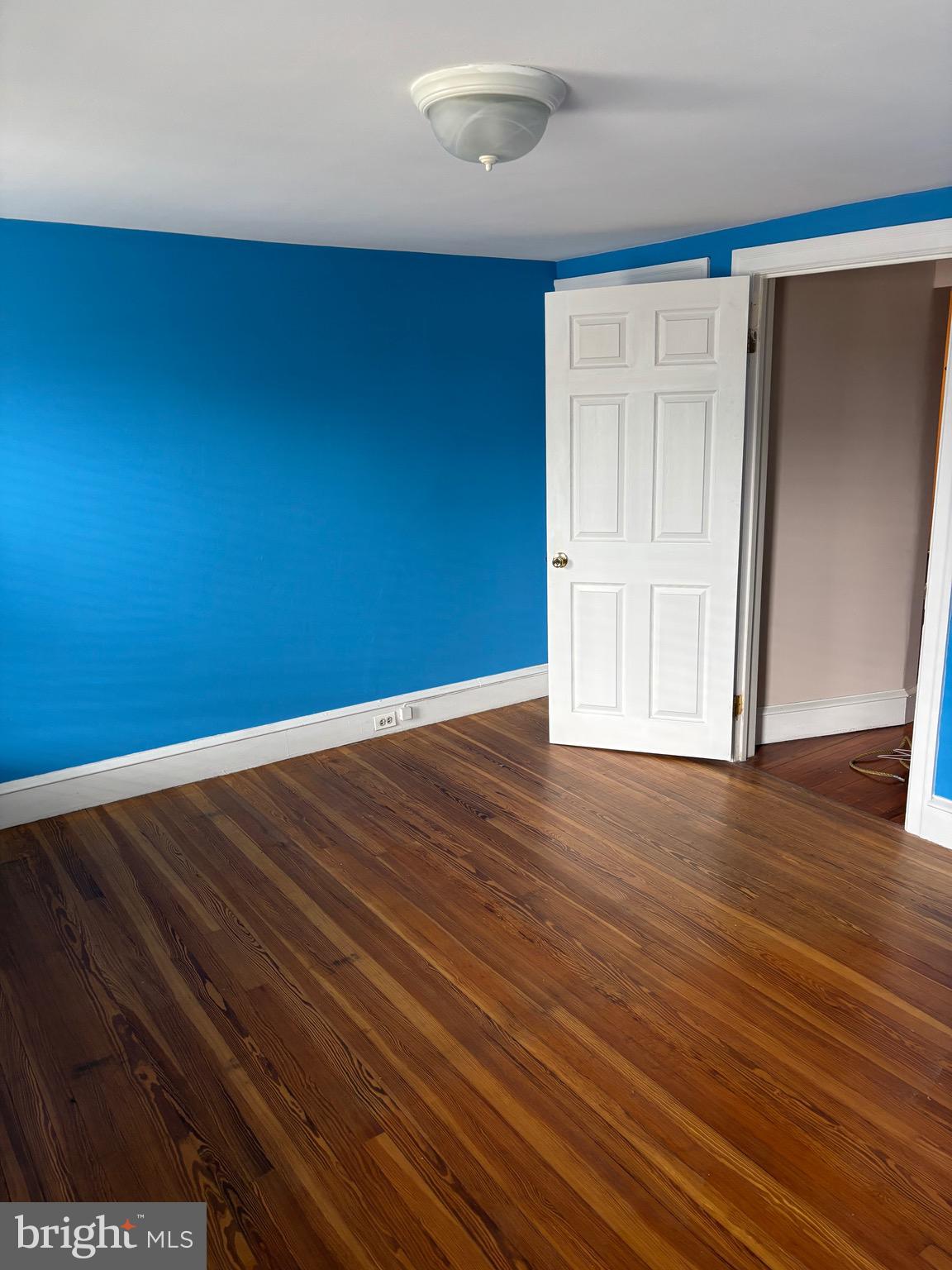 6783 Ridge Avenue Philadelphia, PA 19128 - Photo 16 of 26 a view of empty room with wooden floor
