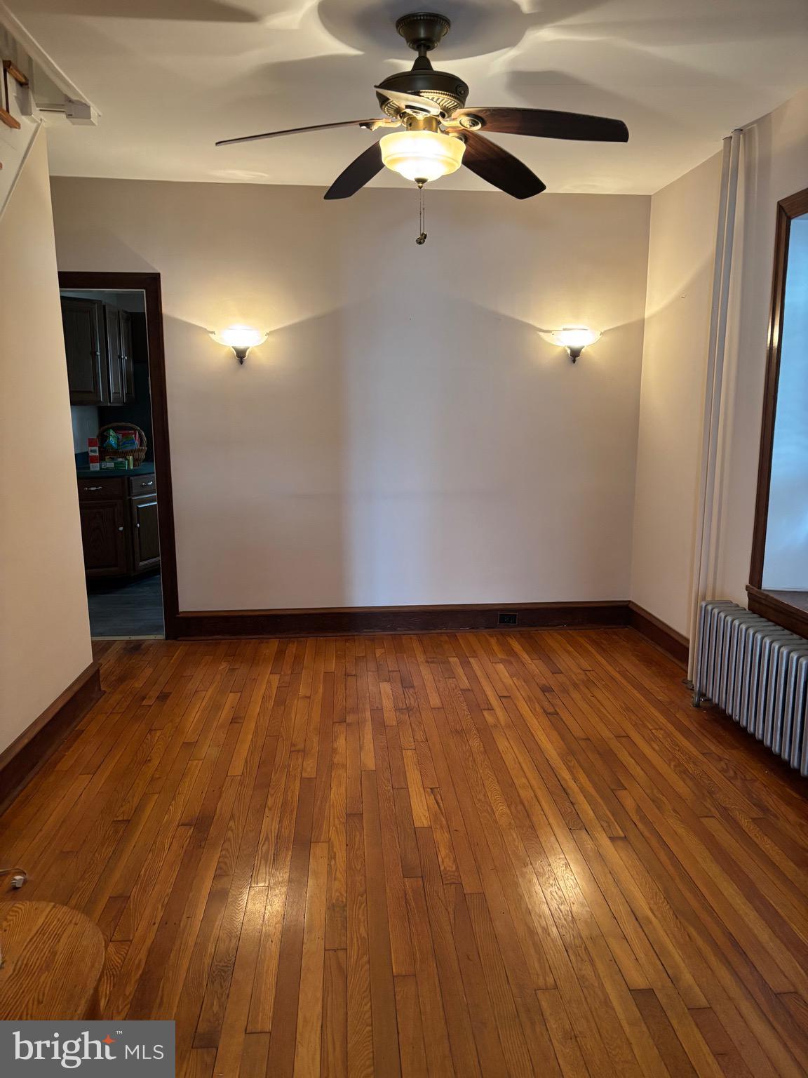 6783 Ridge Avenue Philadelphia, PA 19128 - Photo 6 of 26 a view of an empty room with wooden floor