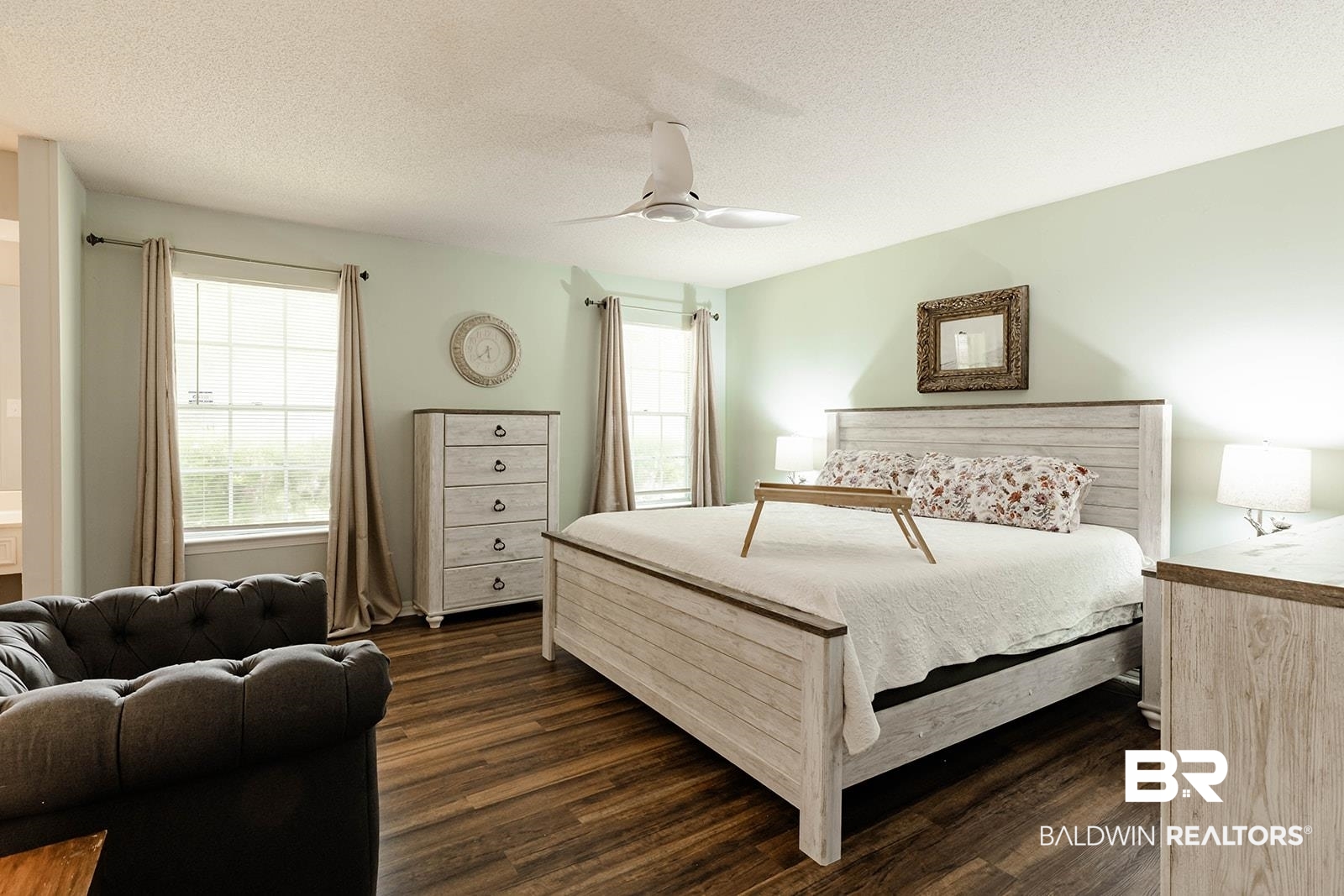 2920 Quail Creek Run Mobile, AL 36695 - Photo 20 of 33 Bedroom featuring dark wood-style floors, ceiling fan, and a textured ceiling