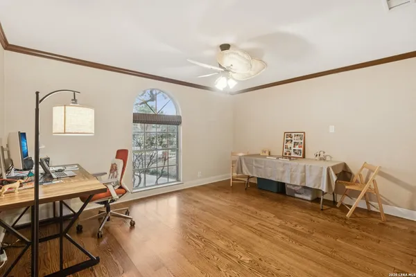 a view of a livingroom with furniture and a window
