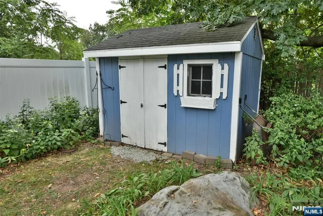 a view of front door and yard
