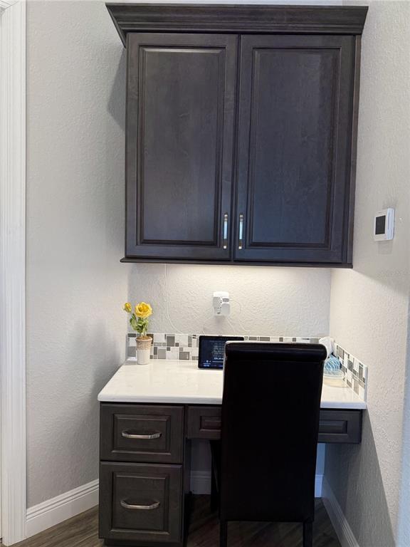 17898 Southwest 72nd Street Road Dunnellon, FL 34432 - Photo 25 of 85 a kitchen with a sink and cabinets