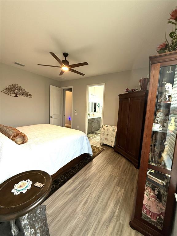 17898 Southwest 72nd Street Road Dunnellon, FL 34432 - Photo 56 of 85 a bed room with a bed and a television