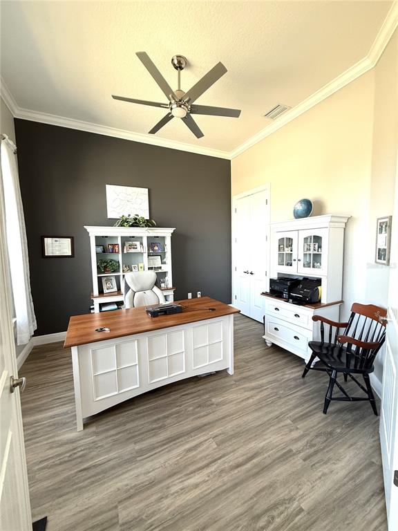 17898 Southwest 72nd Street Road Dunnellon, FL 34432 - Photo 60 of 85 a living room with furniture and a wooden floor