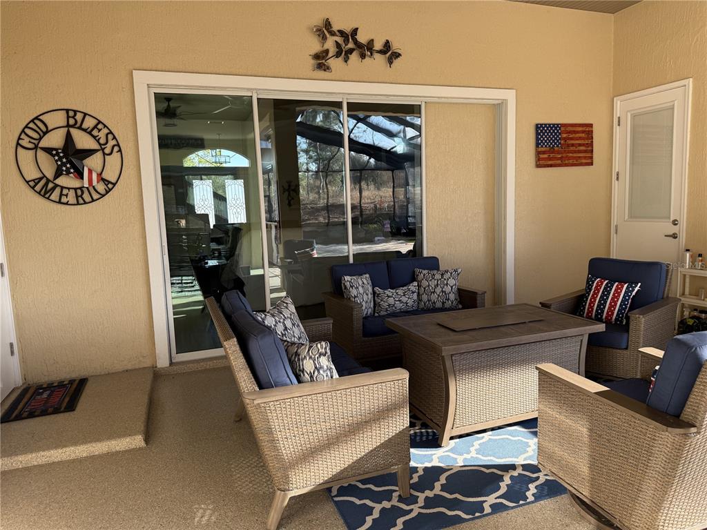 17898 Southwest 72nd Street Road Dunnellon, FL 34432 - Photo 69 of 85 a living room with furniture and a window