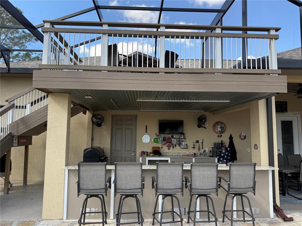 17898 Southwest 72nd Street Road Dunnellon, FL 34432 - Photo 74 of 85 a view of a dining room with furniture