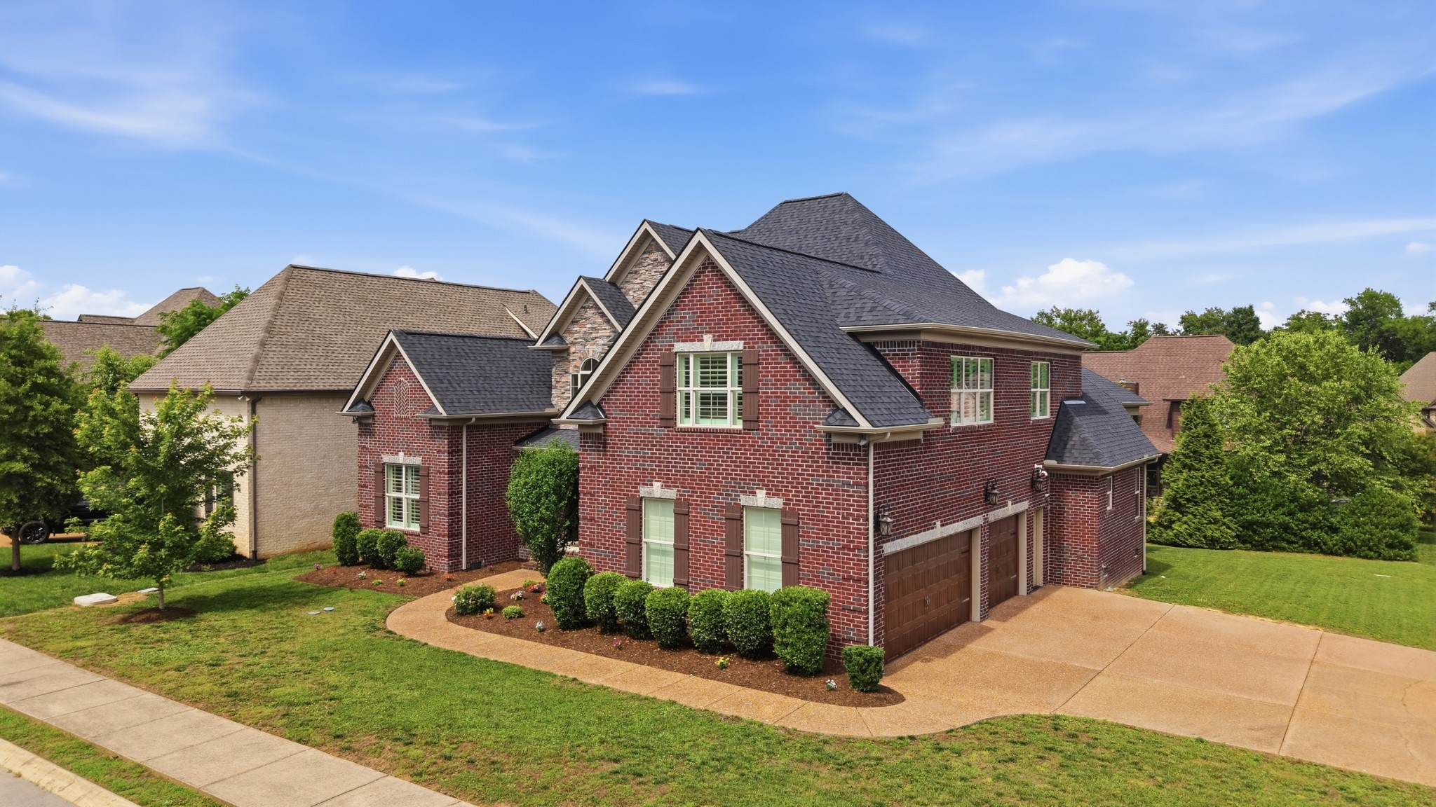 6000 Wallaby Court Spring Hill, TN 37174 - Photo 3 of 57 a front view of a house with a yard