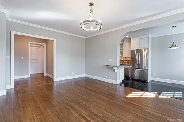 a view of a livingroom with wooden floor
