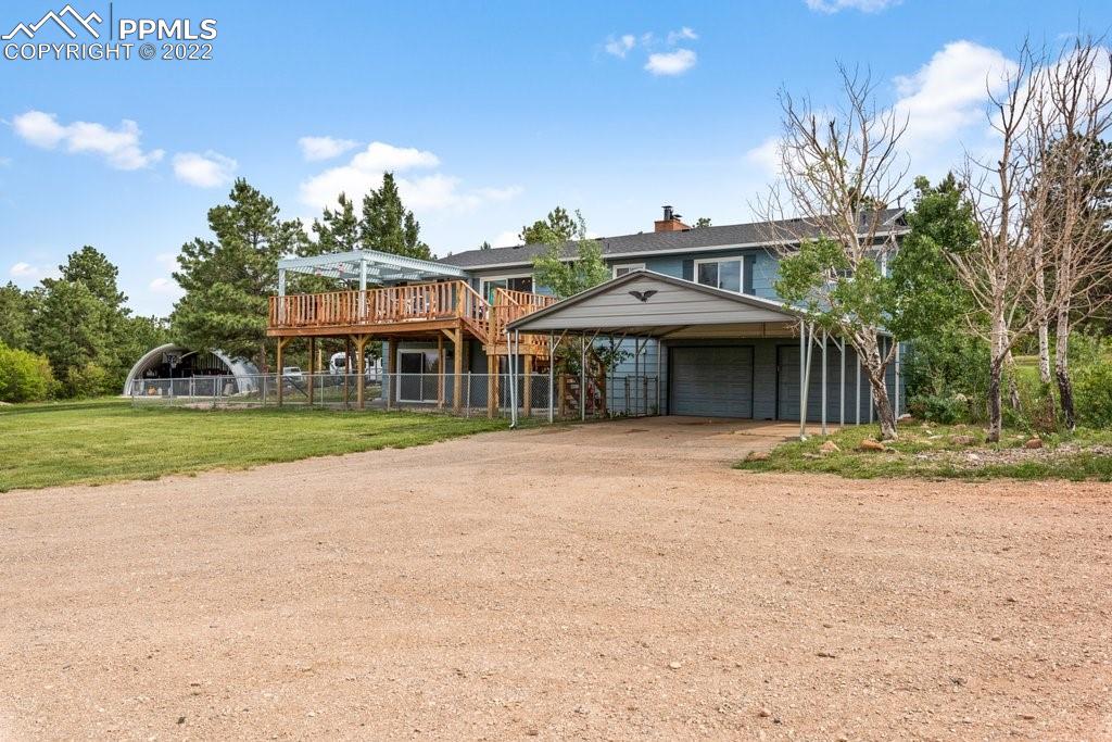 1847 County Road, Unit 671 Rye, CO 81069 - Photo 38 of 42 a front view of a house with a yard