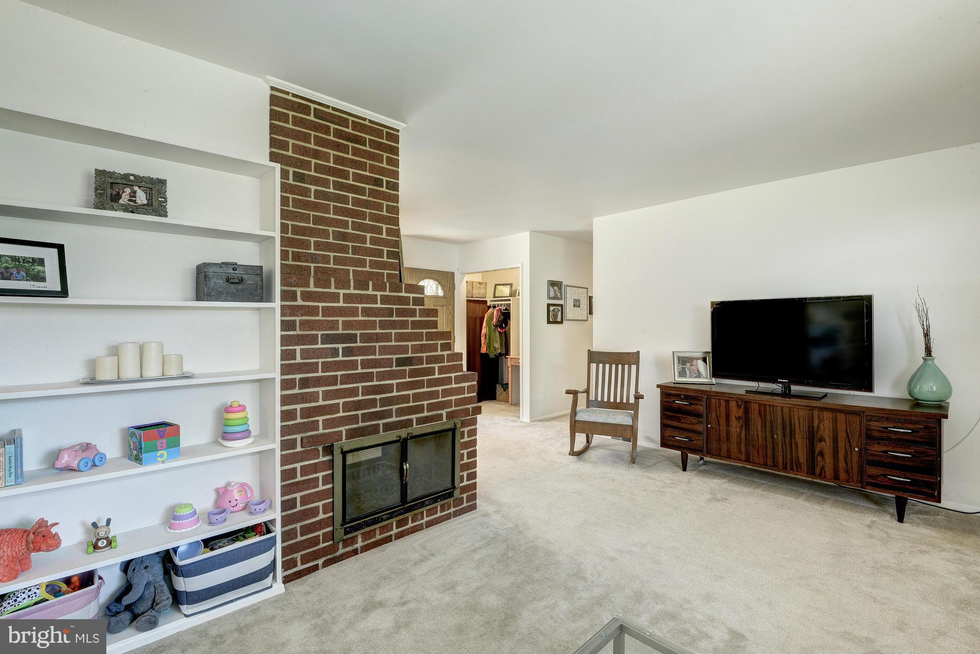 7418 Farnum Street Springfield, VA 22151 - Photo 12 of 30 Living Room w/ Built-In Bookcases