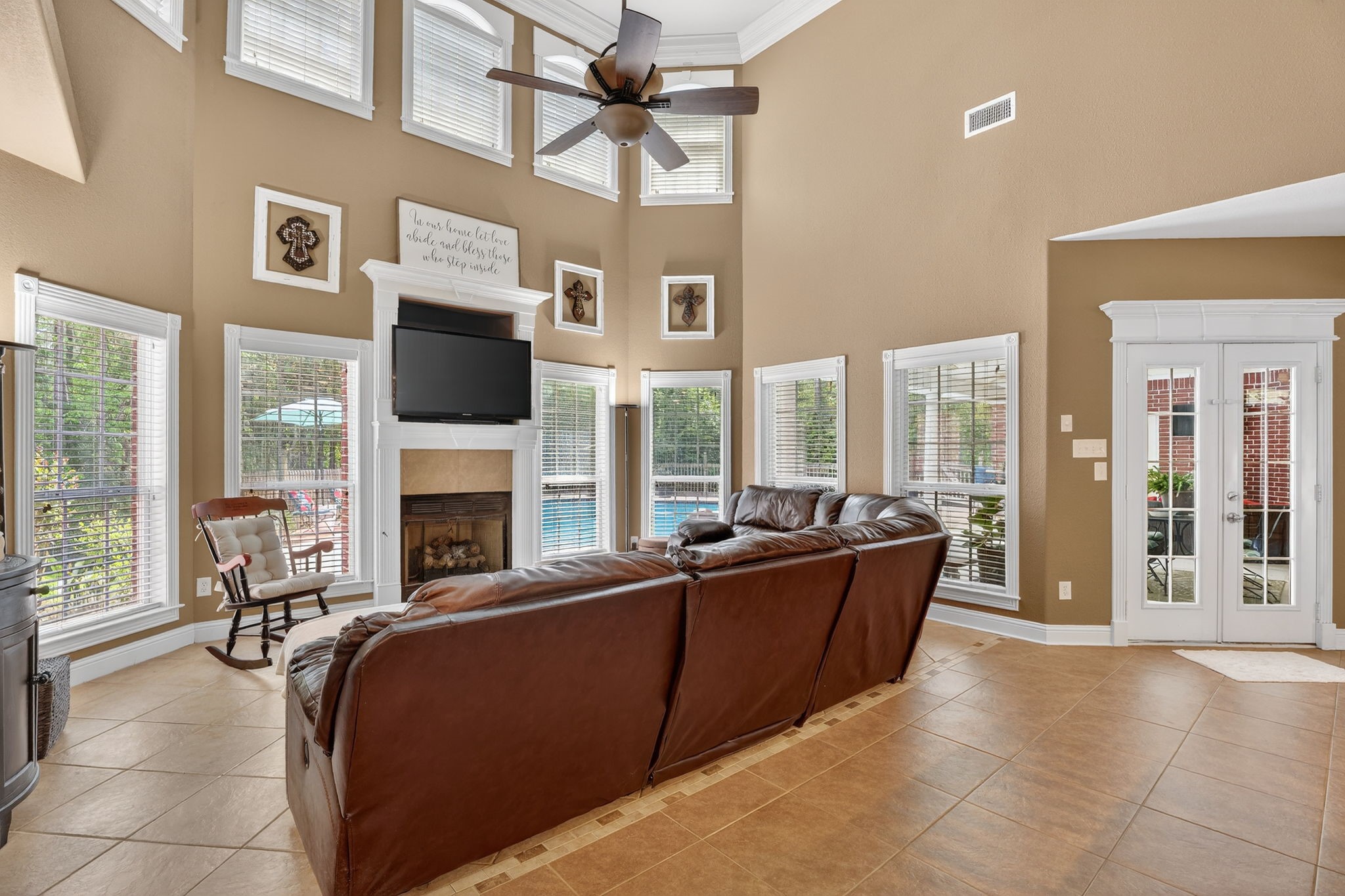 341 Billy Clark Road Huntington, TX 75949 - Photo 24 of 40 a living room with furniture a fireplace and a flat screen tv