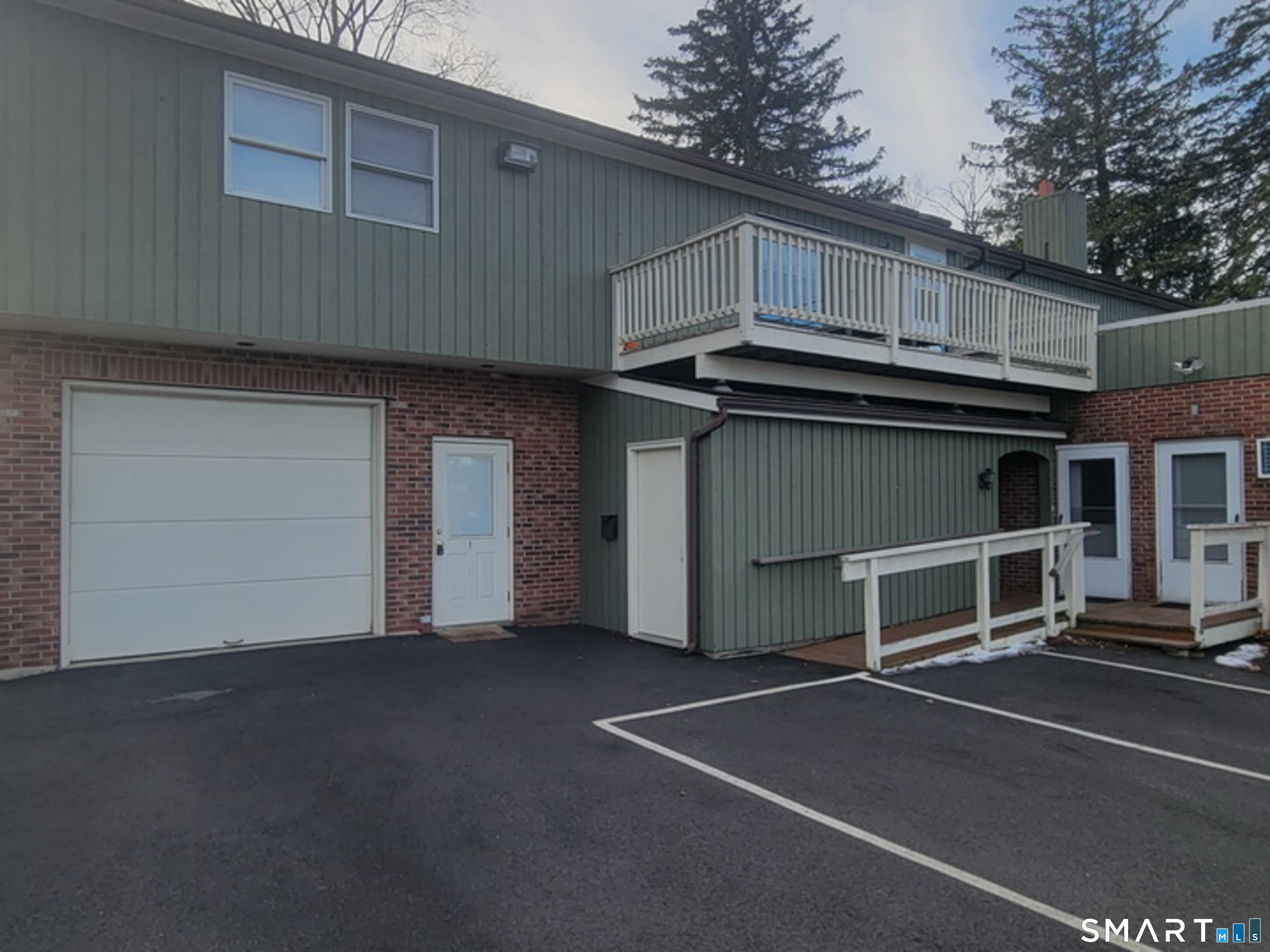 109 Wooster Street, Unit F Bethel, CT 06801 - Photo 1 of 11 a view of a car garage