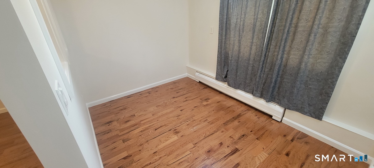 109 Wooster Street, Unit F Bethel, CT 06801 - Photo 6 of 11 a view of a room