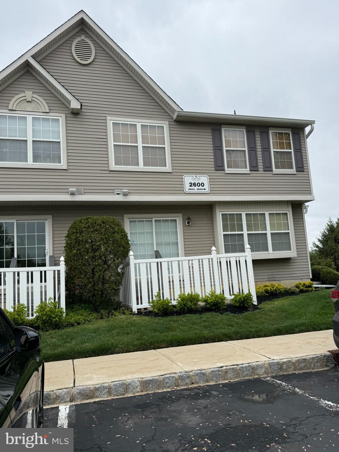 2605 Gramercy Way Mount Laurel, NJ 08054 - Photo 1 of 44 a front view of a house with a garden