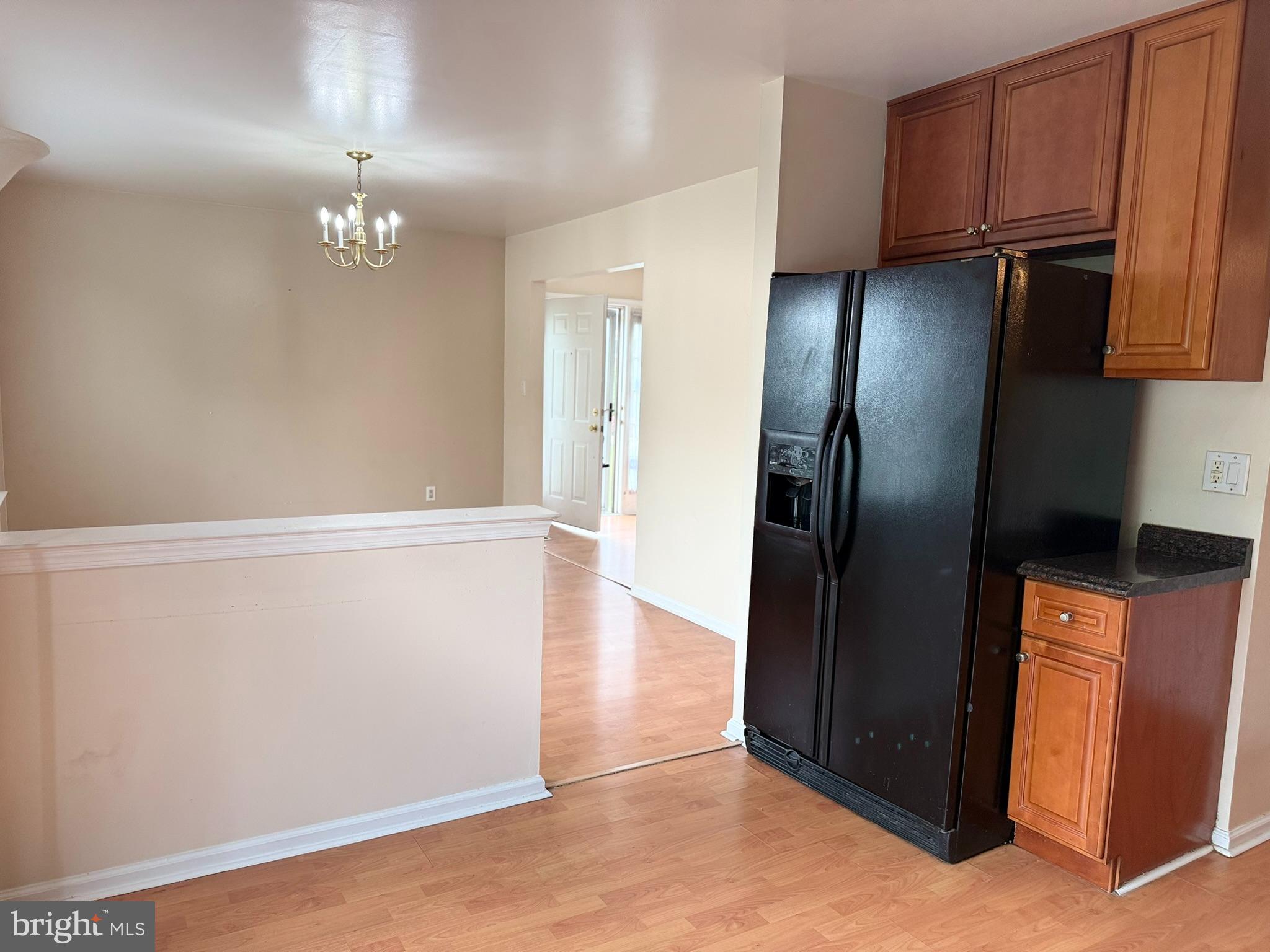 2605 Gramercy Way Mount Laurel, NJ 08054 - Photo 20 of 44 a view of a kitchen with stainless steel appliances wooden floor and a refrigerator