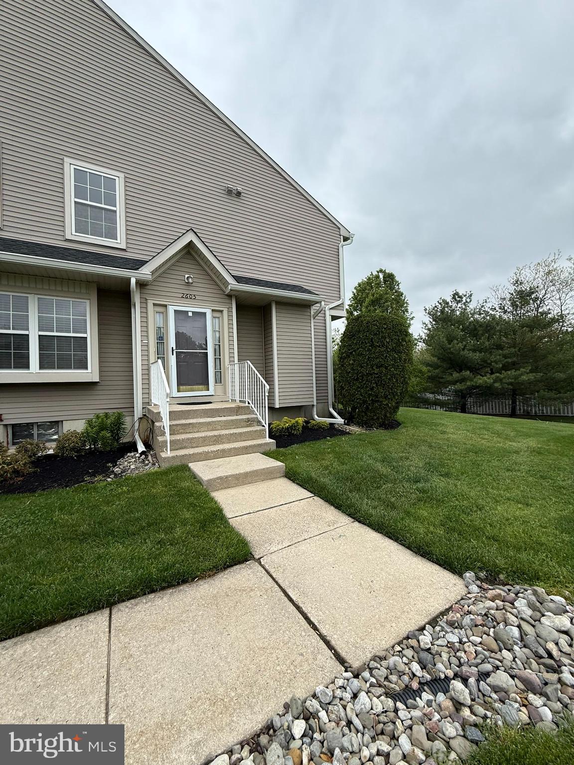 2605 Gramercy Way Mount Laurel, NJ 08054 - Photo 2 of 44 a front view of a house with a yard