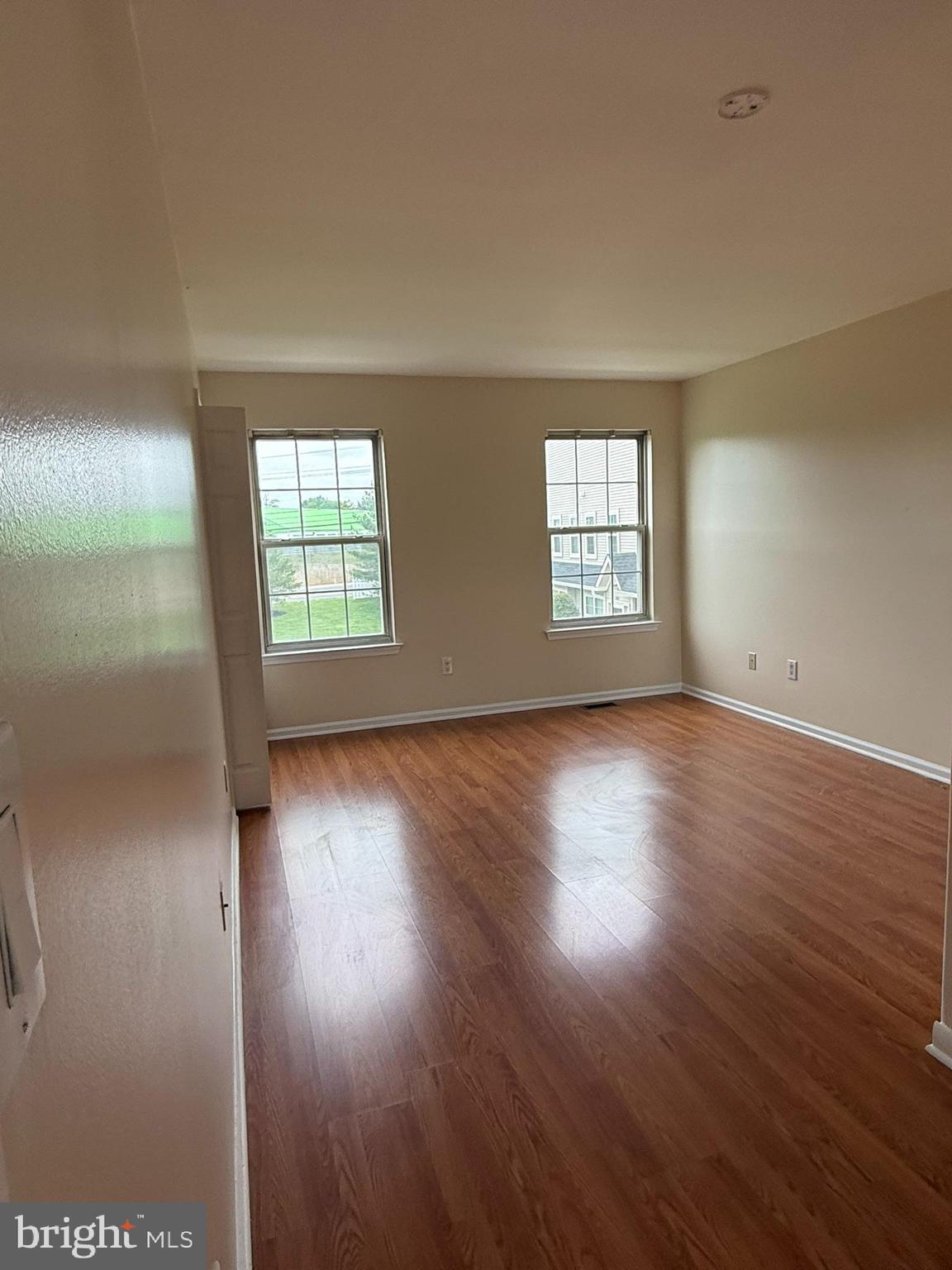 2605 Gramercy Way Mount Laurel, NJ 08054 - Photo 24 of 44 an empty room with wooden floor and windows