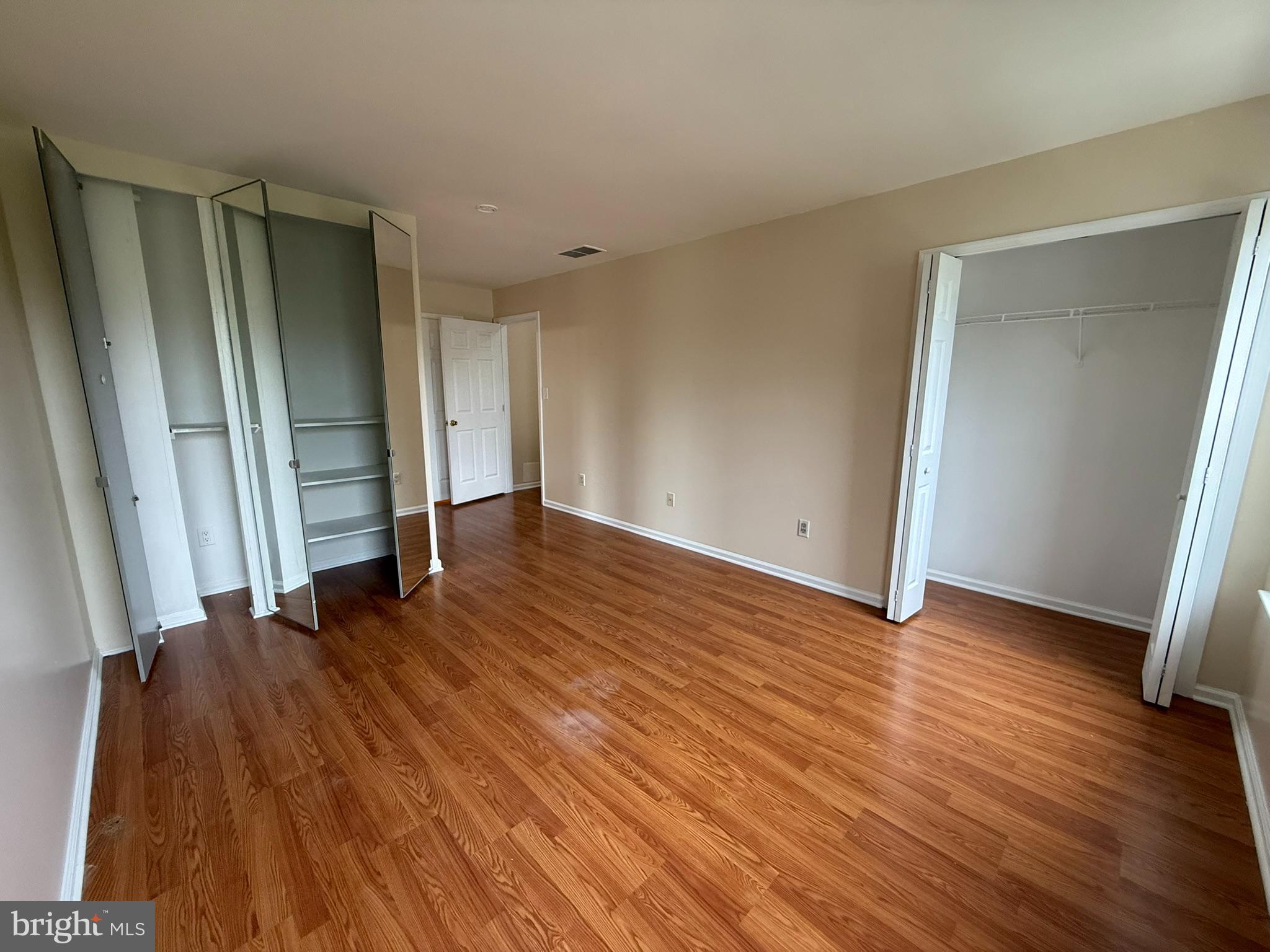 2605 Gramercy Way Mount Laurel, NJ 08054 - Photo 25 of 44 an empty room with wooden floor and closet
