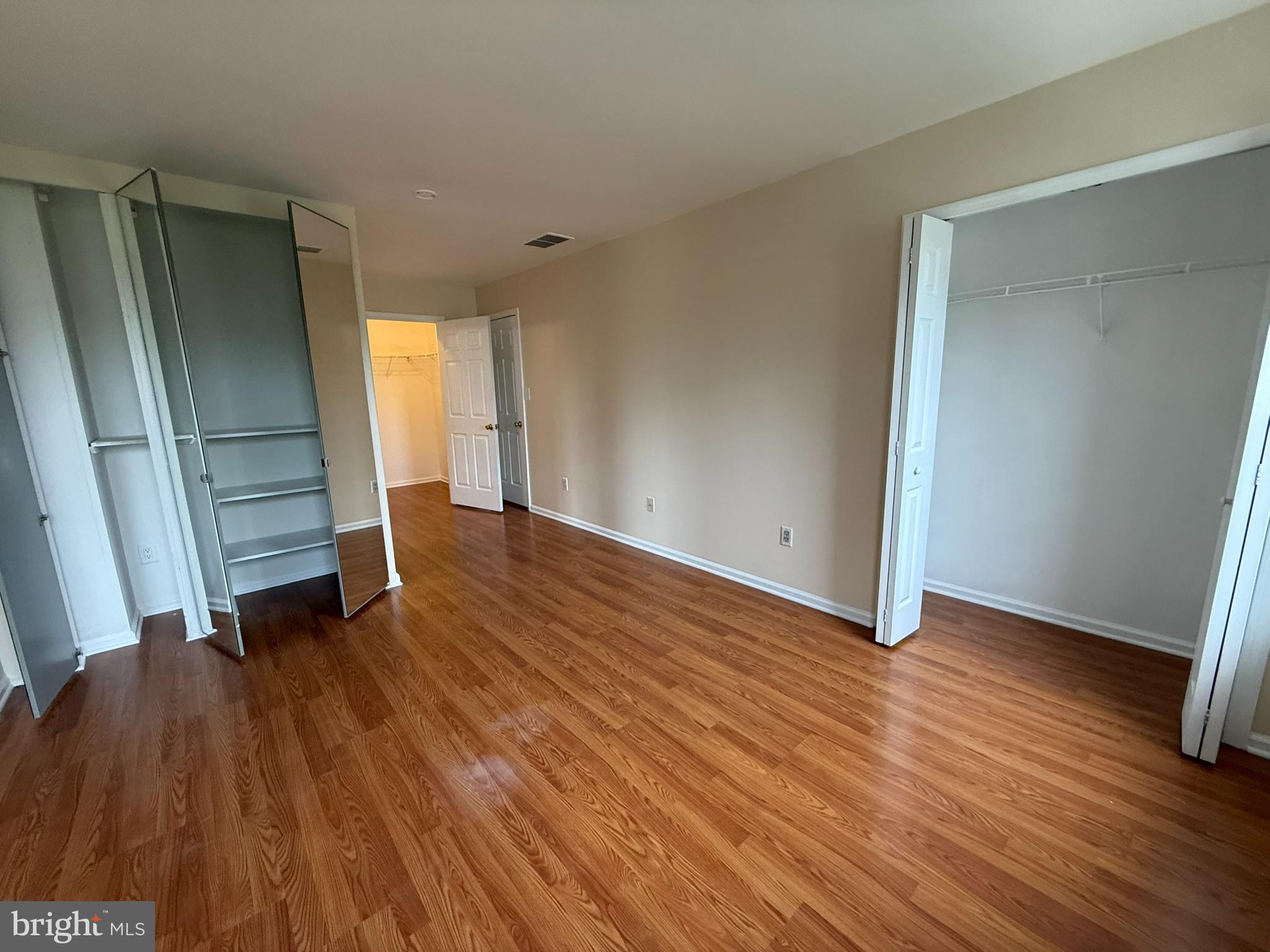 2605 Gramercy Way Mount Laurel, NJ 08054 - Photo 26 of 44 an empty room with wooden floor and a window