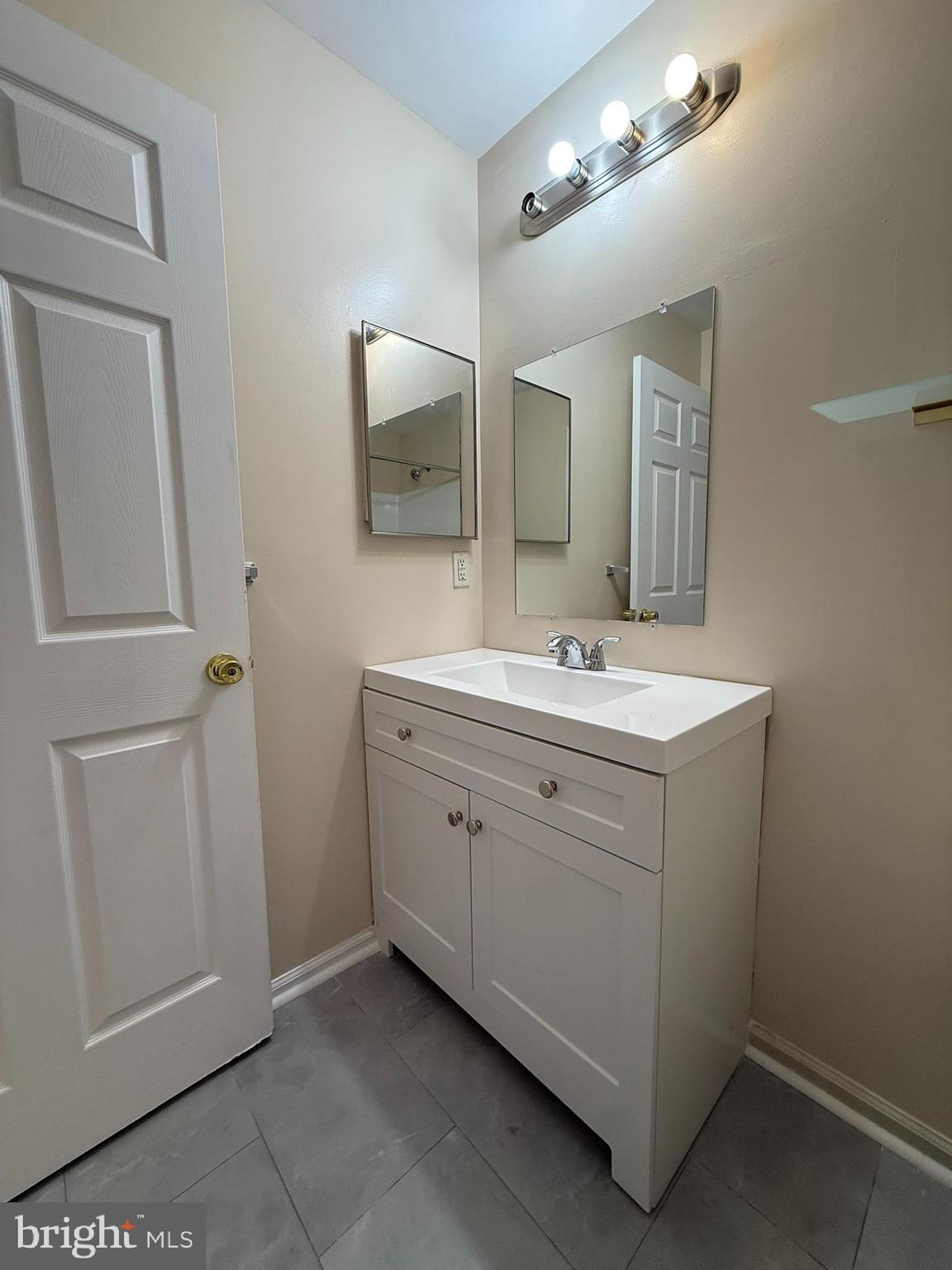 2605 Gramercy Way Mount Laurel, NJ 08054 - Photo 30 of 44 a bathroom with a double vanity sink and a mirror