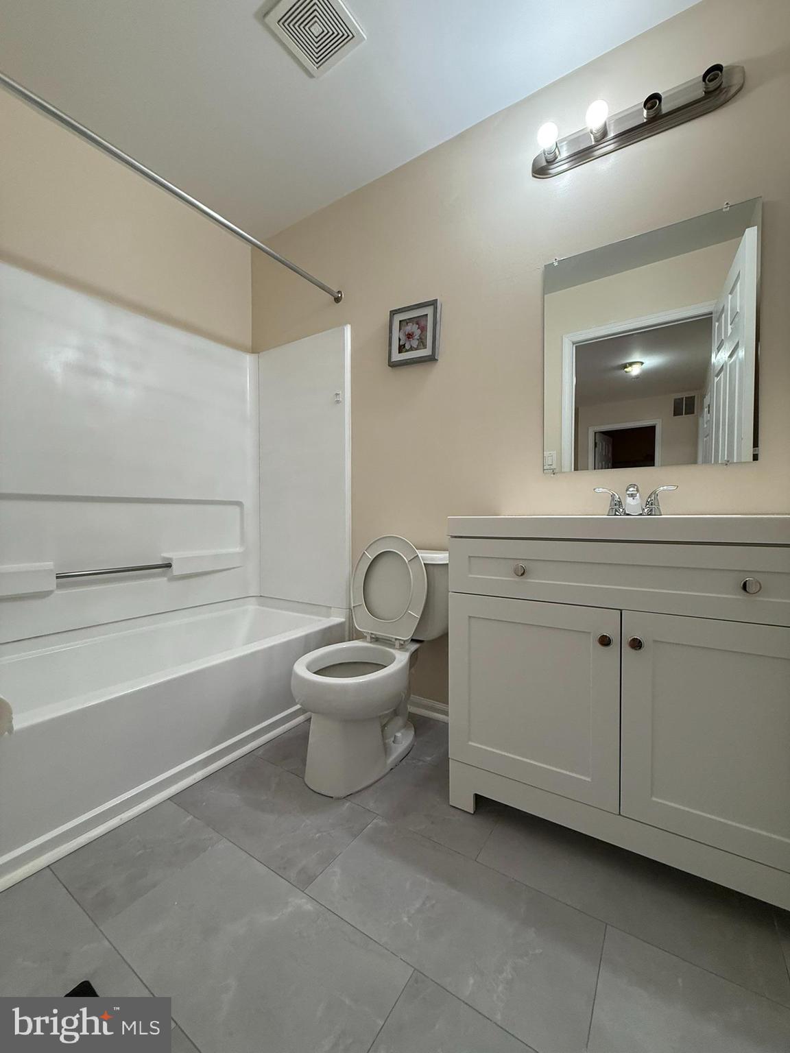 2605 Gramercy Way Mount Laurel, NJ 08054 - Photo 32 of 44 a spacious bathroom with a toilet a sink and bathtub