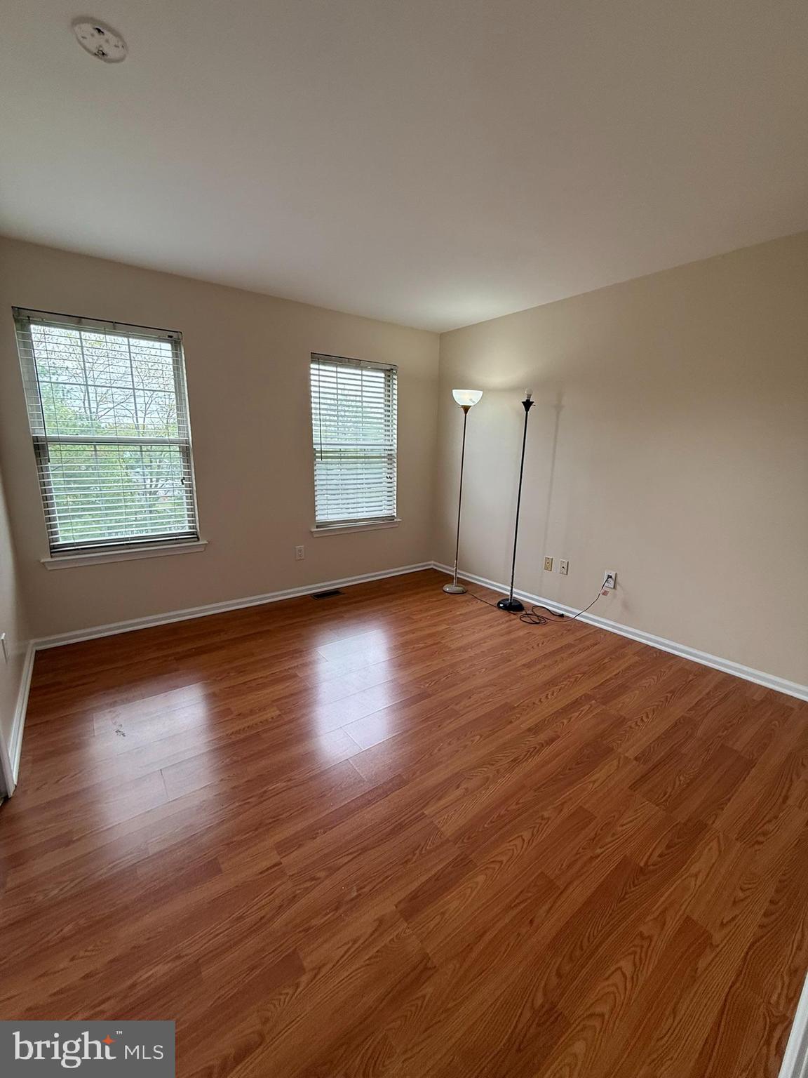 2605 Gramercy Way Mount Laurel, NJ 08054 - Photo 37 of 44 an empty room with wooden floor and windows